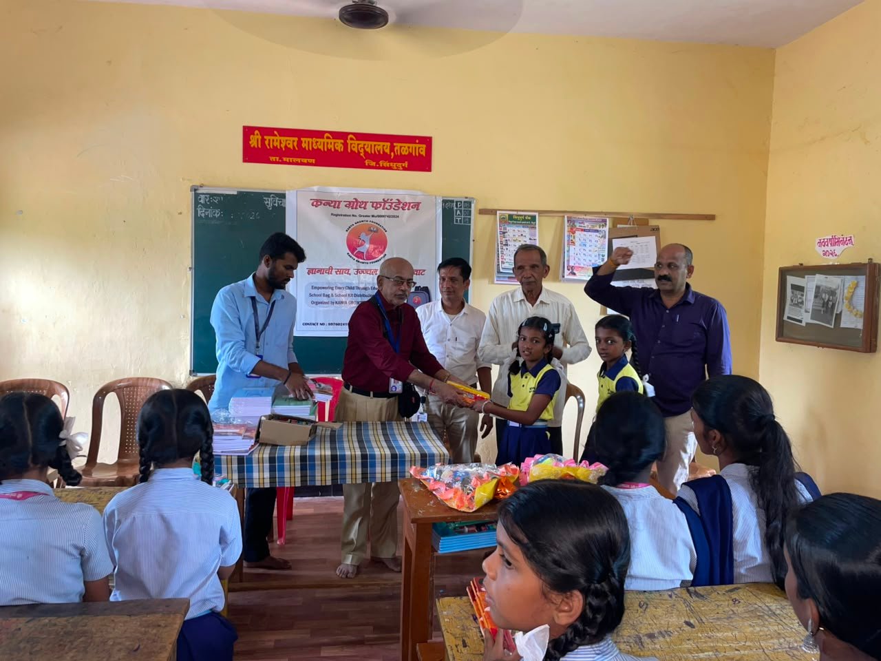 Kit distribution ceremony at a Konkan school